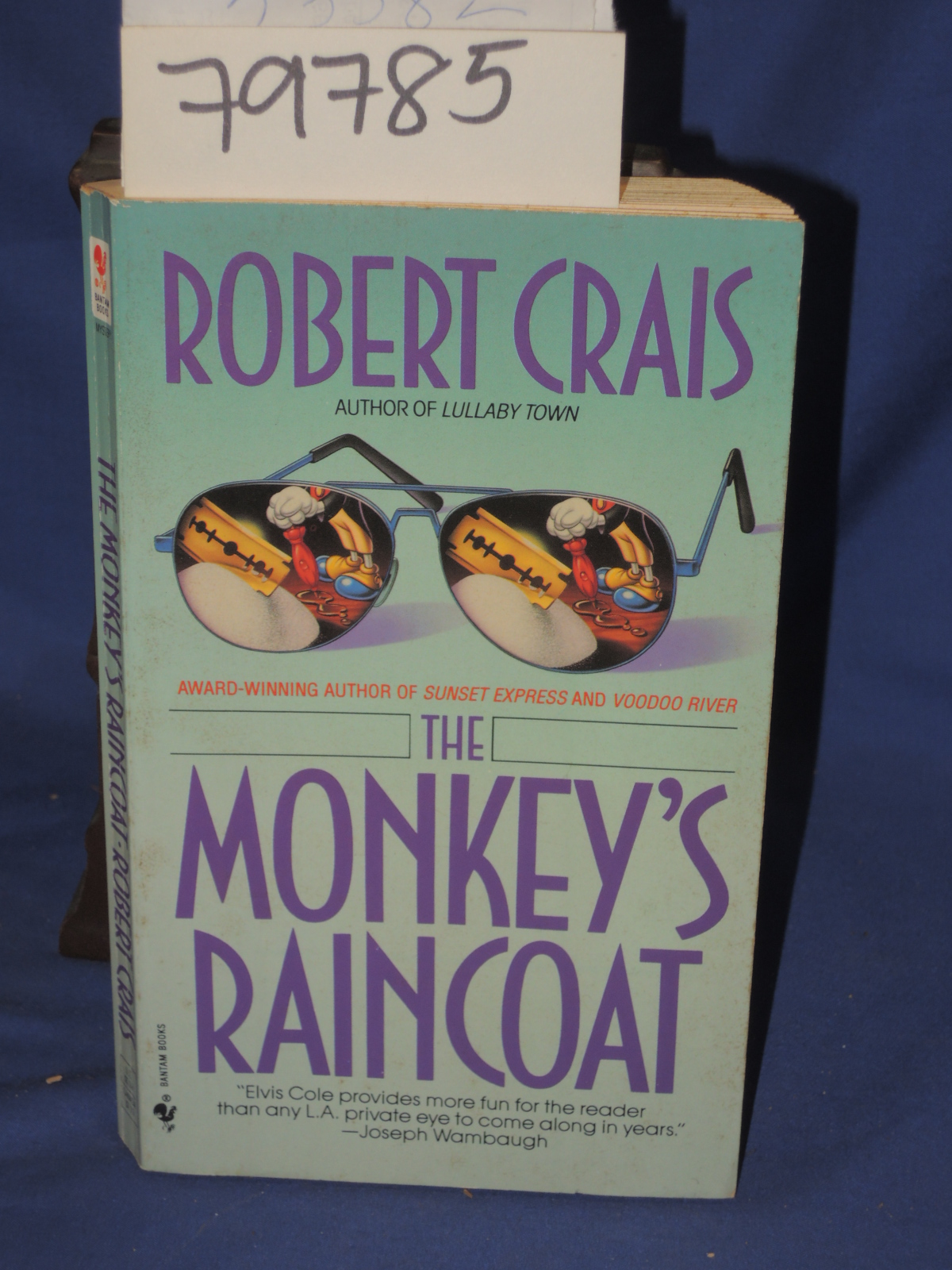 CRAIS, ROBERT SIGNED BY AUTHOR;: THE MONKEY'S RAINCOAT