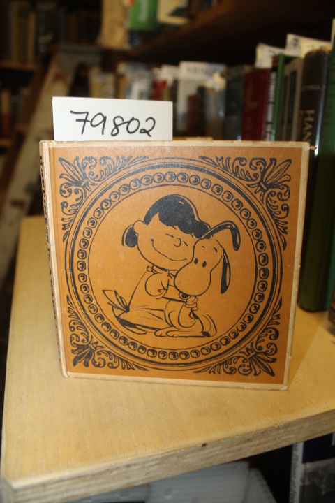 Schulz, Charles M.: HAPPINESS IS A WARM PUPPY