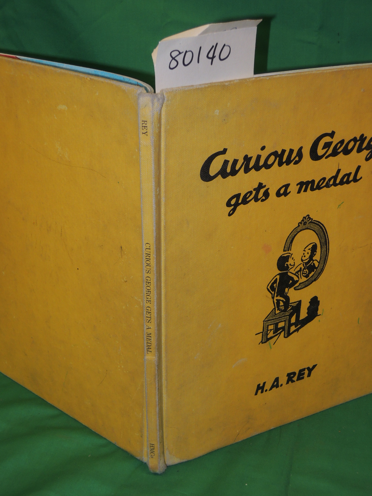 REY, H.A.: CURIOUS GEORGE GETS A MEDAL