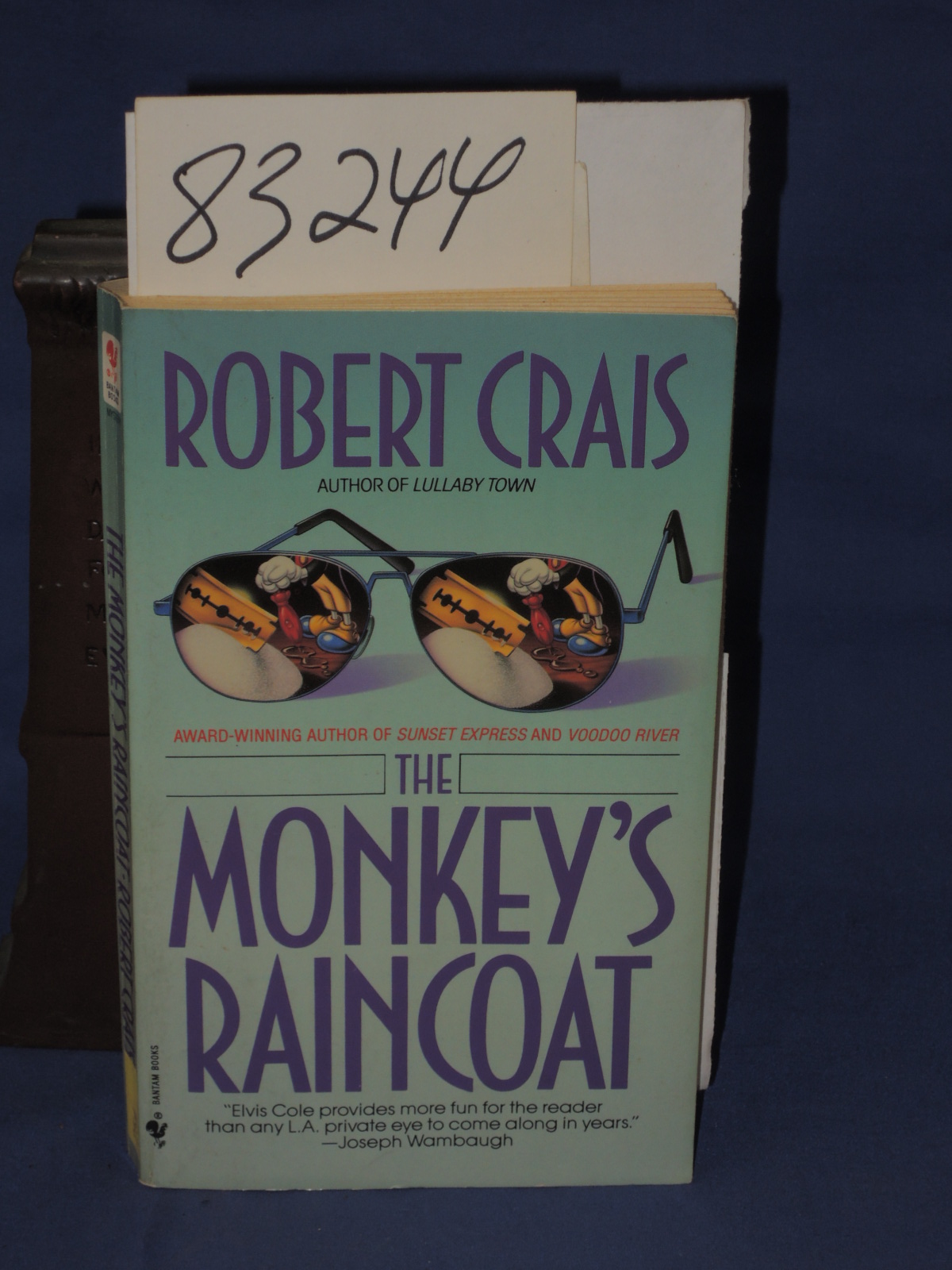 Crais, Robert signed by author.: The Monkey's Raincoat