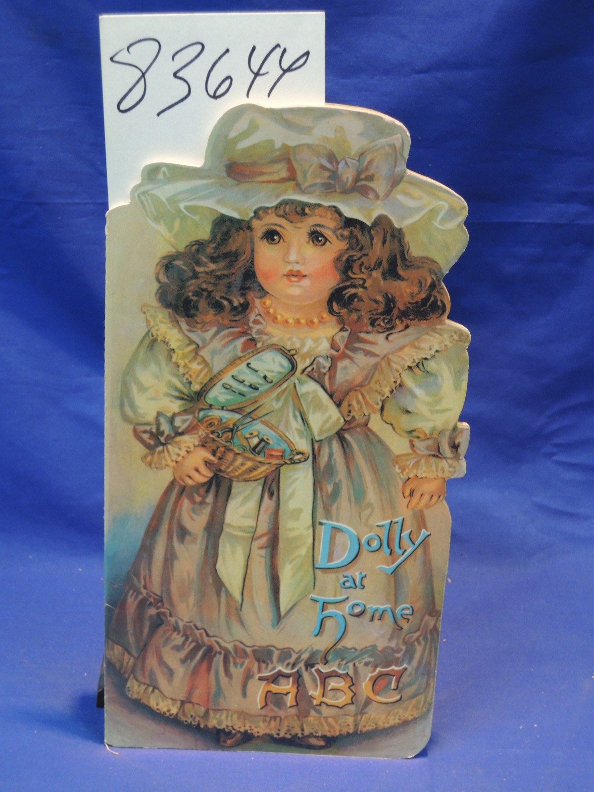 Merrimack: Dolly at Home ABC ( BOOK SCULPTURED IN SHAPE OF GIRL )