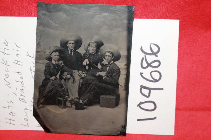 TIN TYPE PHOTOGRAPH: TIN TYPE PHOTOGRAPH OF FOUR PEOPLE WIDE BRIM STRAW HATS;...