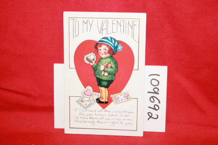 CHILD HOLDING PRESENTS AND VALENTINES CARDS: VALENTINES DAY POSTCARD